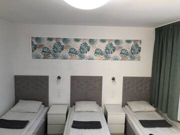 Фото номера Стандартный четырехместный номер Хостелы SIECHNICE Noclegi г. Siechnice 5